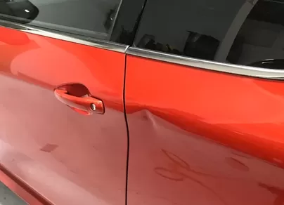 vertical creases & sharp lines dent repair example